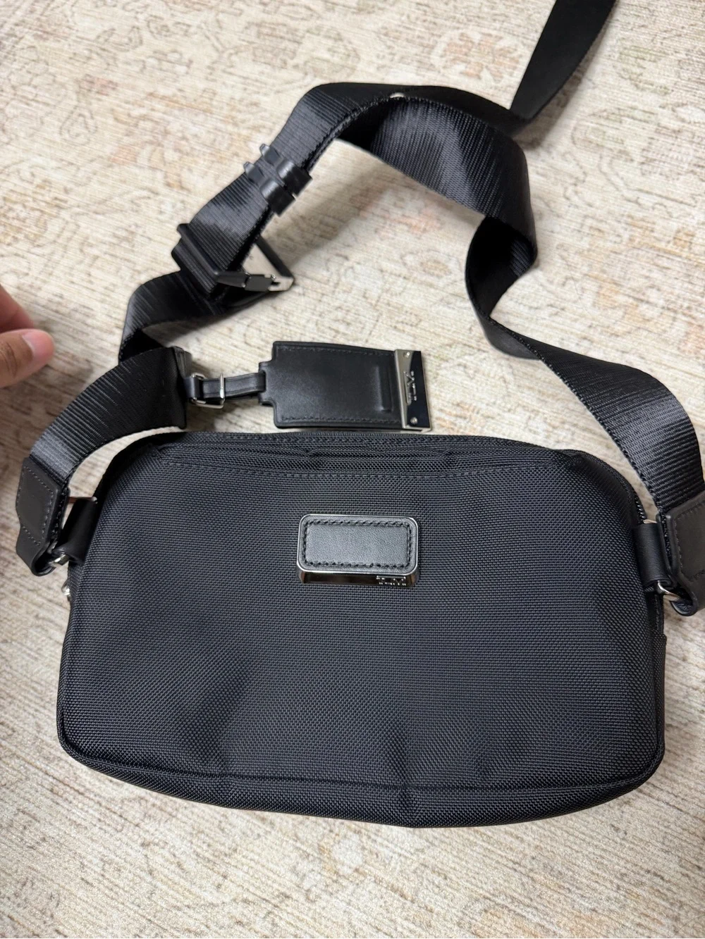 Tumi Black Men's Sling Belt Bag with Silver Accents